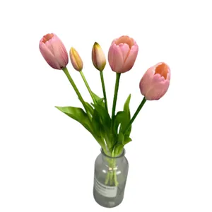 Pink artificial tulip bouquet in a grey glass vase with realistic petal texture
