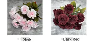 Detailed comparison of pink and dark red artificial carnations with realistic green leaves