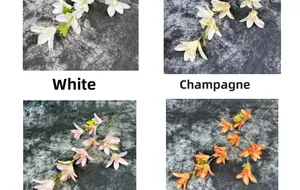 Detail view of artificial lily bouquets in white, champagne, pink, and orange silk fabric