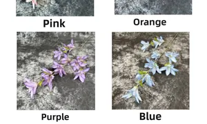 Detailed view of artificial rain lily silk flowers in pink orange purple and blue colors