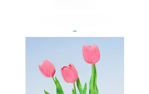 Detail of three pink silk fabric tulips with realistic textures for home floral decor