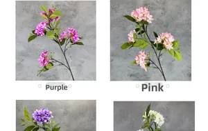 Detail view of artificial hydrangea flowers in fuchsia, pink, purple, and white silk clusters