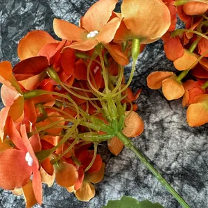 Orange hydrangea artificial silk flowers with detailed realistic stem connections
