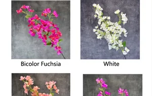 Detailed view of two-tone purplish red and white artificial bougainvillea flowers