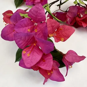 Realistic artificial bougainvillea branch with vibrant magenta petals for wedding decor