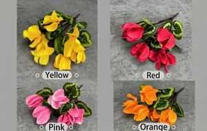 Detail of faux Cyclamen petals and variegated leaves in red and yellow variants