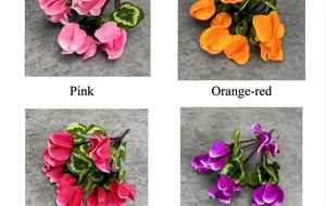 Collage of artificial cyclamen flowers in pink, orange and purple with textured leaves