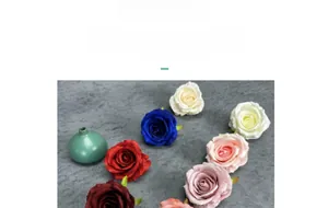 Macro shot of artificial silk rose heads showing full buds and premium layered fabric texture