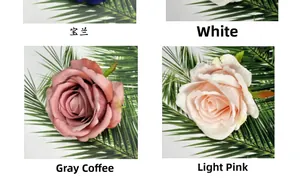 Macro view of matte fabric rose heads in sapphire, white, gray, and pale pink colors