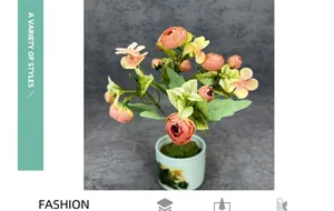 Artificial rose bud bouquet in a blue landscape ceramic pot for home desk decoration