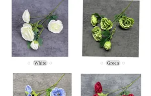 Detailed view of artificial multi-layered rose bouquets in white and green colors