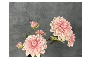 Close-up of artificial pink dahlia branch with silk petals for wedding home decor