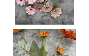 Detailed macro view of 6-head artificial Zinnia silk petals and vibrant lifelike leaves