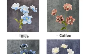 Detail view of four-headed artificial anemone flowers in blue and coffee colors