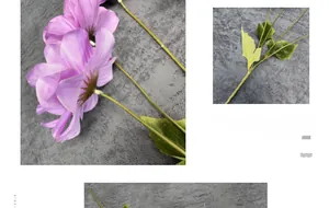 Close-up of artificial purple anemone silk flowers with realistic petals and green leaves