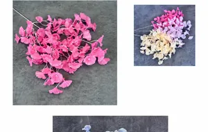 Detail of colorful artificial ginkgo leaf branches for wedding and home decoration