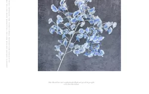 Macro detail of artificial blue trumpet flowers with delicate pleated petals and stems