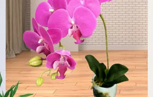 Detailed view of artificial pink orchid flowers with realistic PU texture in white pot