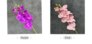 Detail view of purple and pink artificial phalaenopsis orchids with realistic petal textures
