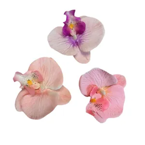 Three assorted artificial orchid flower heads for wedding DIY and home decorations