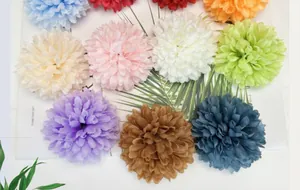 Close-up of colorful artificial pom-pom hydrangea flower heads for DIY crafts and decor