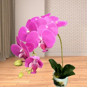 Pink artificial Phalaenopsis orchid in white ceramic pot with realistic PU petals