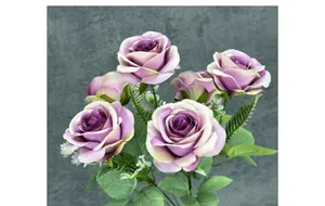 Close-up of purple gradient artificial roses with detailed silk petals and green leaves