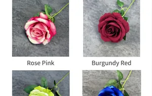 Close-up of velvet artificial roses in rose pink and wine red colors for home decor