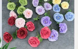 Close-up of multi-layered silk petals and detailed texture of artificial Ranunculus