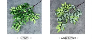 Detailweergave van kunstmatige wilgentakken in groene en grijsgroene kleuren