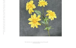 Vista dettagliata di fiori di dalia artificiali con quattro teste di fiori gialli realistici
