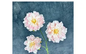 Close-up of artificial peony with three pink gradient flower heads and yellow stamens