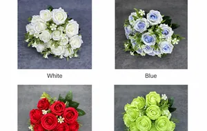 Close-up of white and blue artificial rose bouquets with realistic green foliage