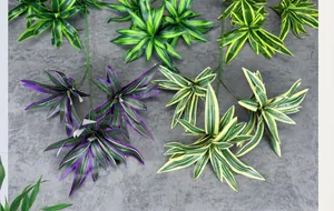 Detailed texture of artificial dracaena leaves with yellow stripes and purple veins