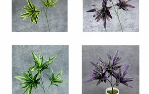 Detail of artificial dracaena leaves in golden-edged light green and purple stripes