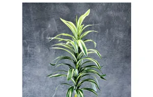 Detailed close-up of artificial lily bamboo with realistic green and yellow edged leaves