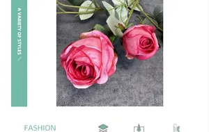 Macro view of pink Milan silk roses with detailed petals and green foliage decor