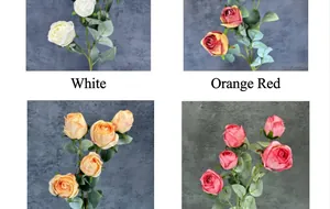Detail of Milanese artificial roses in white, orange red, champagne and pink with realistic buds
