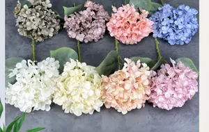Detailed close-up showing eight colorful faux hydrangea heads for floral home decoration