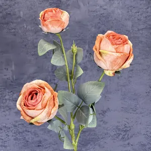 Three-headed artificial silk roses with orange gradient petals and realistic green leaves