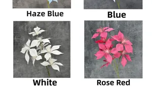 Detailed views of multi-color artificial poinsettia flowers in haze blue, blue, white, and rose red