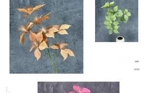 Detail of faux clematis stems in vintage orange, green, and pink for home floral decor