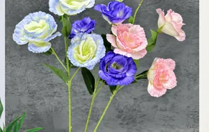 Detailed view of lifelike artificial silk eustoma flowers in blue, purple and pink hues