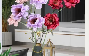 Close-up of silk artificial gardenia petals in dark red and pink for home decor