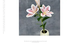 Macro detail of lifelike artificial pink lily flower in a ceramic vase for home decor