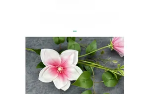 Detail of 3D printed clematis petals with realistic gradient texture and green silk leaves