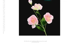 Macro detail of artificial pink lisianthus with realistic petals and green foliage