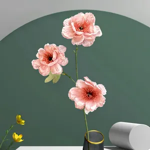 Elegant artificial three-head pink gardenia in a gray vase for home wedding decoration