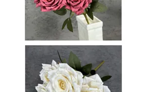 Detail view of artificial diamond roses in magenta and cream with realistic petals