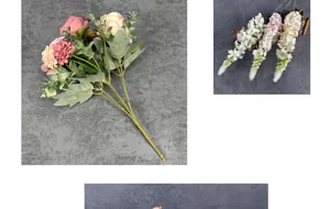 Dettaglio ravvicinato di rose artificiali realistiche rosa e gialle con foglie verdi